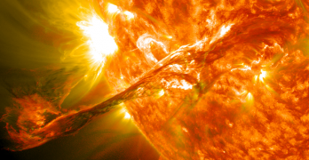 A coronal mass ejection, which created a solar tsunami when it ejected, is impacting the Earth now. Image: