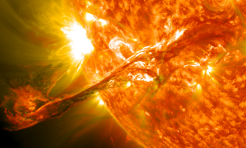 A coronal mass ejection, which created a solar tsunami when it ejected, is impacting the Earth now. Image: