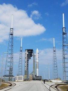 The GOES-R weather satellite stands atop an Atlas V rocket at Launch Pad 41 within NASA's Kennedy Space Center.