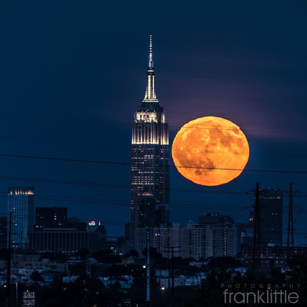 Frank Little's recent photograph of the Harvest Moon with the Empire State Building.