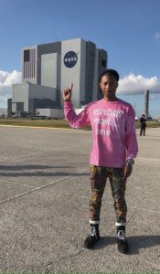 Hidden Figures producer Pharrell Williams points to the Vehicle Assembly Building at NASA's Kennedy Space Center. Photograph: Pharrell