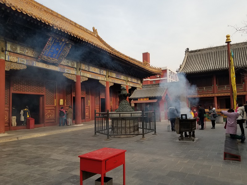 An incense ceremony is underway at Beijing's Yonghegong Lama Temple on Friday, December 30, during a lull in the smog. But a resurgence of poor air quality scores has banned the practice for now. Photo: Weatherboy