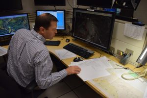 National Hurricane Center Meteorologist Daniel Brown busy at his work station. A Weatherboy meteorologist had the chance to catch up with Brown to understand what happens at the National Hurricane Center during the off-season months. Photo: National Hurricane Center
