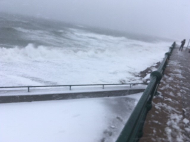Waves crashing against the sea wall.  Photo: Weatherboy