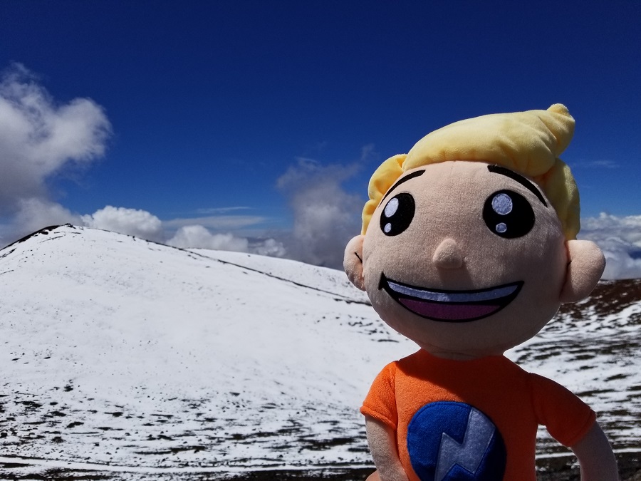 The Weatherboy mascot stands next to a May 2017 snowfall on Hawaii's Big Island. Image: Weatherboy