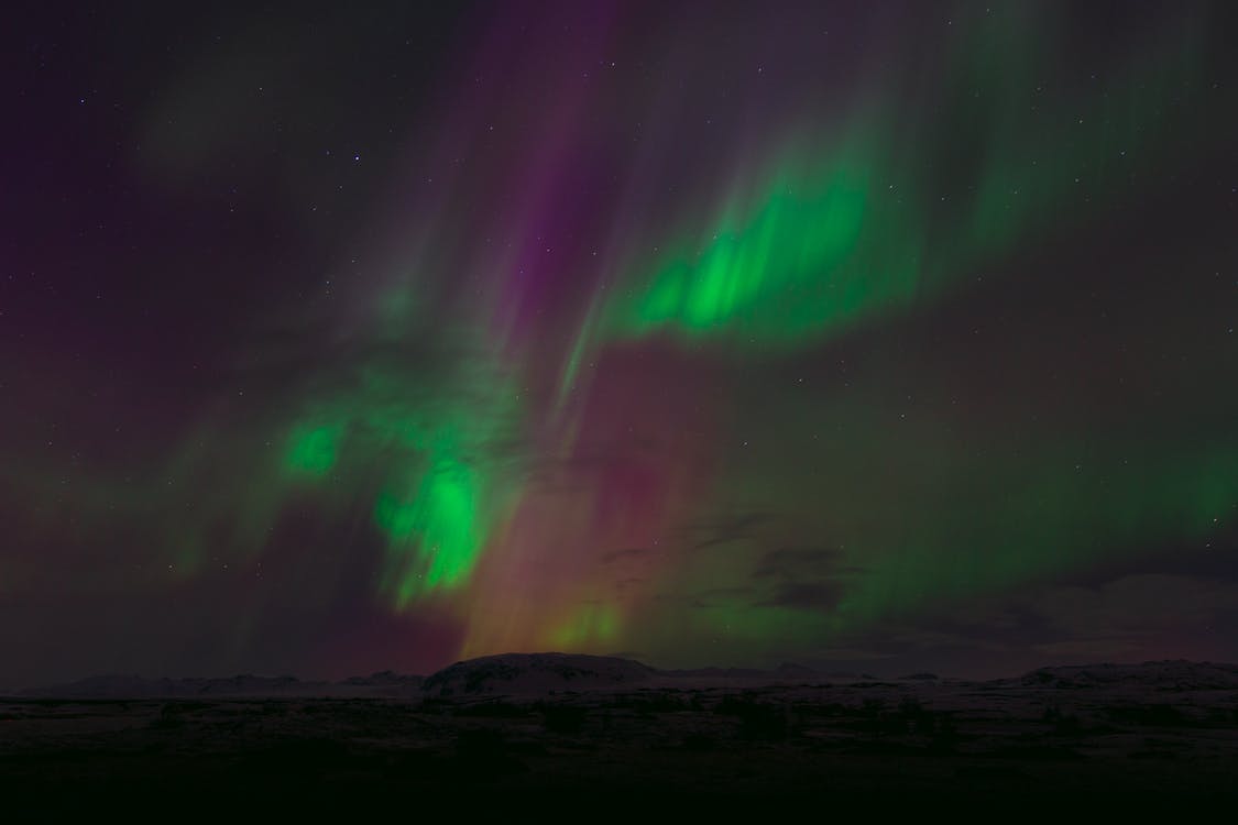 Aurora, also known in the Northern Hemisphere as "Northern Lights", is typically associated with clear, cold winter nights at northern latitudes.
