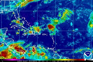 Latest satellite map shows what's left of Tropical Depression #4 north and east of Puerto Rico.  Image: NOAA