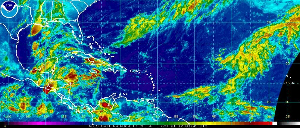 Current satellite view of the tropics shows scattered showers and storms, but no organized systems showing signs of tropical development. Image: NOAA
