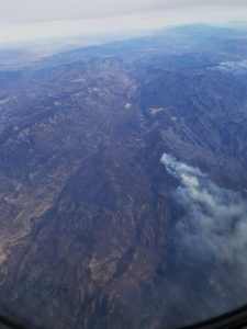 Even from more than 20,000 feet above the flames, the smell of smoke stings the nose. Photograph: Weatherboy