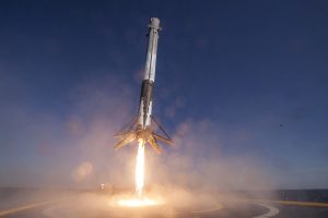 A Falcon9 rocket makes a landing on a drone barge. For the larger Falcon Heavy inaugural launch, not only will a rocket return to a drone ship, but 2 others will attempt to return to land at the same time. Image: SpaceX