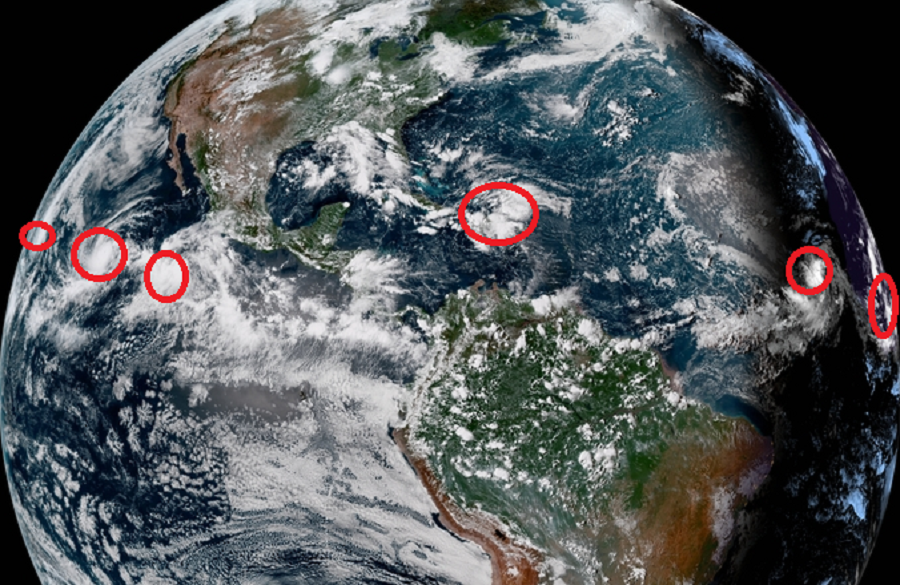 More tropical storms and hurricanes are forecast to form in both the Atlantic and Eastern Pacific hurricane basins over the next five days. Image: NOAA / weatherboy.com
