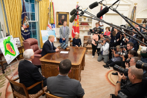 President Trump greets reporters and photographers after a briefing with government leaders on Hurricane Florence in the White House. Image: The White House