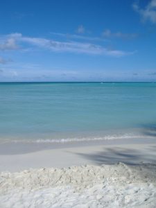 Beaches on Saipan feature white sand and usually calm surf. This beach, photographed prior to Yutu's arrival, was hit very hard. Photograph: Weatherboy