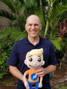 USAA's Rob Galbraith poses with Weatherboy's brand mascot at a recent Wildfire Summit. Image: Weatherboy