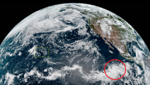Barbara, circled in red, is gaining strength. Over time, it could bring impacts to Hawaii, located inside the green box. This is the latest weather satellite image from the new GOES-West satellite. Image: NOAA