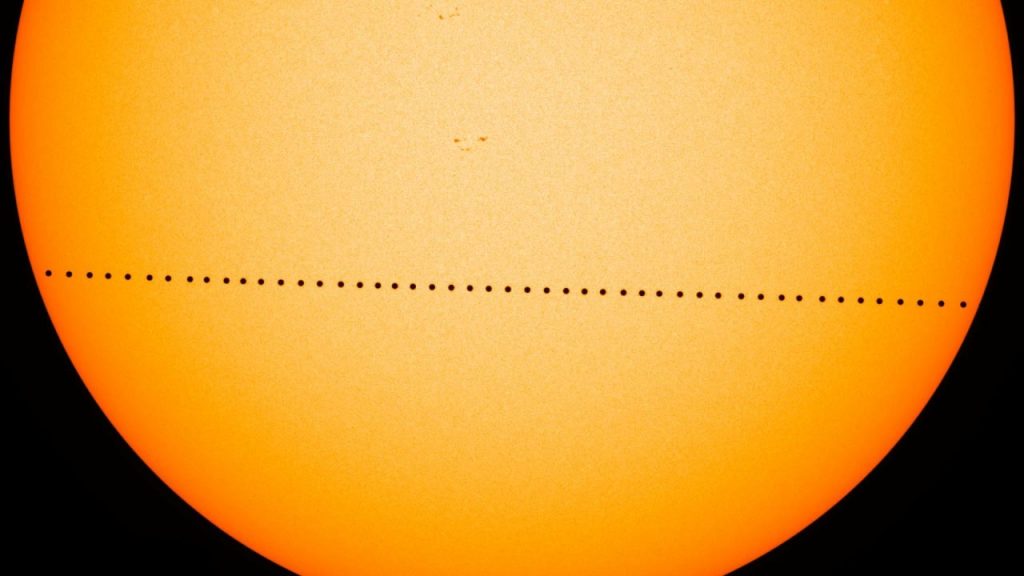 NASA's Solar Dynamics Observatory saw Mercury transit the Sun in 2016, as this merged photograph shows Mercury move across the sun. Image: NASA