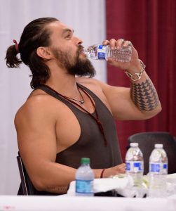 Jason Momoa drinks from a single use water bottle. Image: Twitter