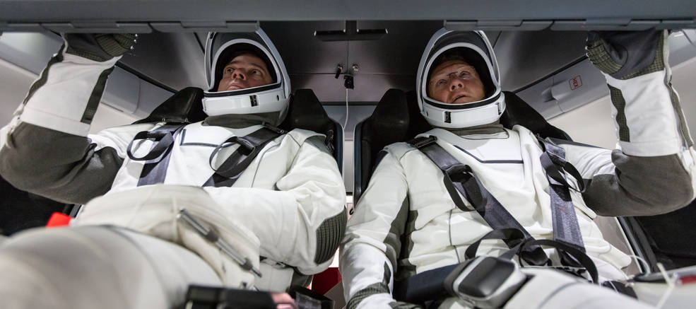 NASA astronauts Doug Hurley and Bob Behnken familiarize themselves with SpaceX’s Crew Dragon. Image: NASA