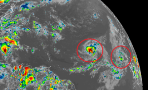 Tropical Storms Paulette, left, and Rene, right, spin about over the Atlantic Ocean. Image: NOAA