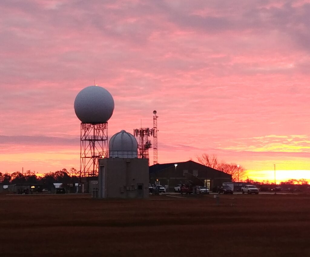 The sun rises over the new NEXRAD RADAR unit in Lakes Charles, Louisiana on the day the unit become operational once again today, January 22, 2021.  Image: NWS 