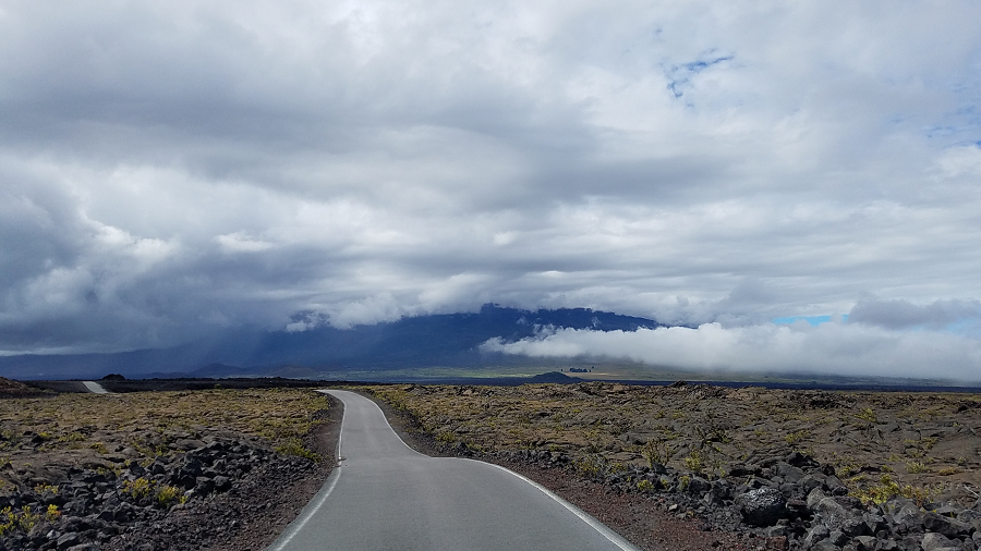 This paved single-lane is the only road that travels up the slopes of the active volcano in Hawaii. The Mauna Loa Access road provides access to different scientific research stations located on the active volcano's slopes. Image: Weatherboy