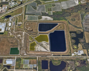 The waste water ponds at the Piney Point site are in the center of this photograph; Manatee County Jail is in the upper left while a FedEx facility is in the lower left. Hundreds of homes exist below this area. Image: Google Maps
