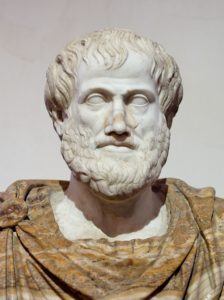 On display in a museum is a bust of Aristotle. 