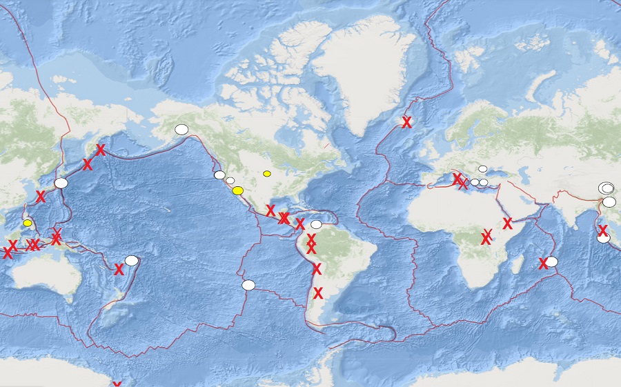 There are many volcanoes erupting around the world today; while dots reflect recent notable earthquakes, the red X's show where a volcano is erupting today. Image: USGS