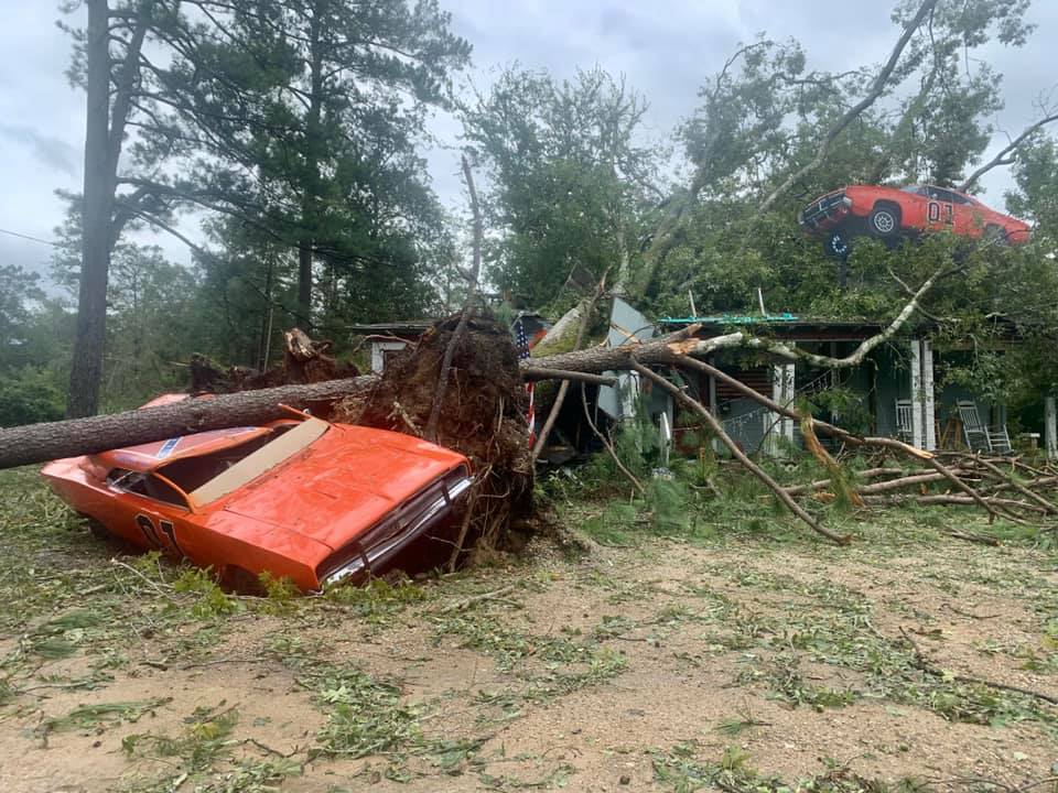 The "General Lee" is smashed by a tree on Dukes of Hazzard's star John Schneider's Louisiana property. Image: John Schneider