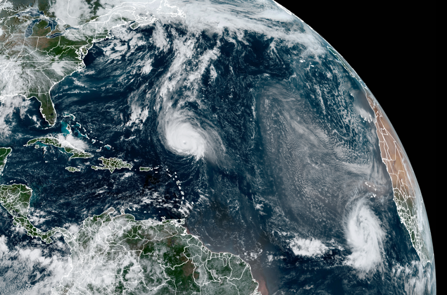 Sam, to the left, and Victor, to the right, spin about over the Atlantic Ocean, as this image from the GOES-East weather satellite shows. Image: NOAA