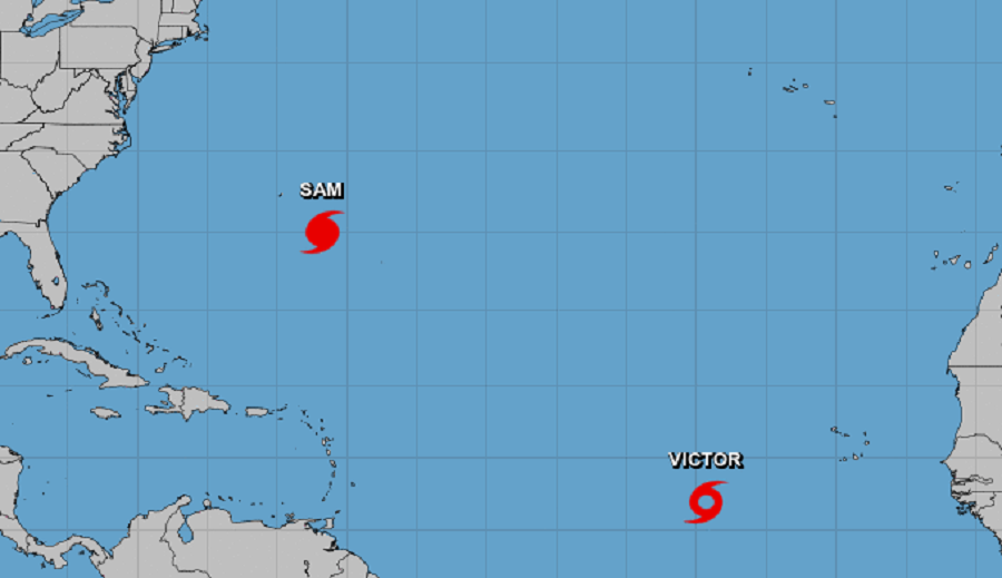Hurricane Sam and Tropical Storm Victor remain over the Atlantic Ocean today.  Image: NHC