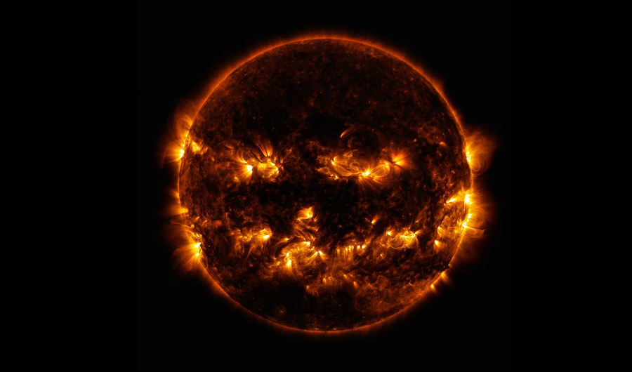 Active regions on the sun combined to look something like a jack-o-lantern’s face in this October 8, 2014 file photo. The image was captured by NASA's Solar Dynamics Observatory, or SDO, which watches the sun at all times from its orbit in space. The active regions in this image appear brighter because those are areas that emit more light and energy. They are markers of an intense and complex set of magnetic fields hovering in the sun’s atmosphere, the corona. This image blends together two sets of extreme ultraviolet wavelengths at 171 and 193 Ångströms, typically colorized in gold and yellow, to create a particularly Halloween-like appearance. Image: NASA/SDO