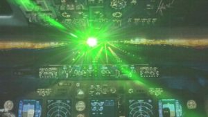 Shining a laser at an aircraft is a serious safety threat; many types of high-powered lasers can incapacitate pilots, many of whom are flying airplanes with hundreds of passengers. Image: FAA