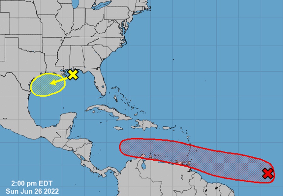 The National Hurricane Center is tracking two areas for potential tropical cyclone development; the red area is the more likely to form of the two.  Image: NHC