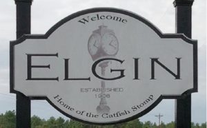 Sign welcomes people to Elgin, "Home of the Catfish Stomp." Image: Elgin / Facebook