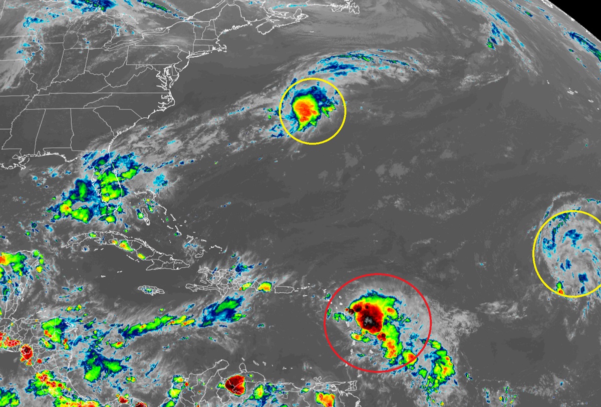 The National Hurricane Center now believes Fiona, circled in red, will strengthen into a hurricane over the next five days. They are also tracking two other systems in the Atlantic, circled in yellow, for signs of possible tropical or subtropical cyclone formation. Image: NOAA