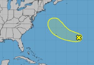 The National Hurricane Center is tracking a disturbance located near the X that could develop into a tropical cyclone and move into the yellow shaded area. Image: NHC