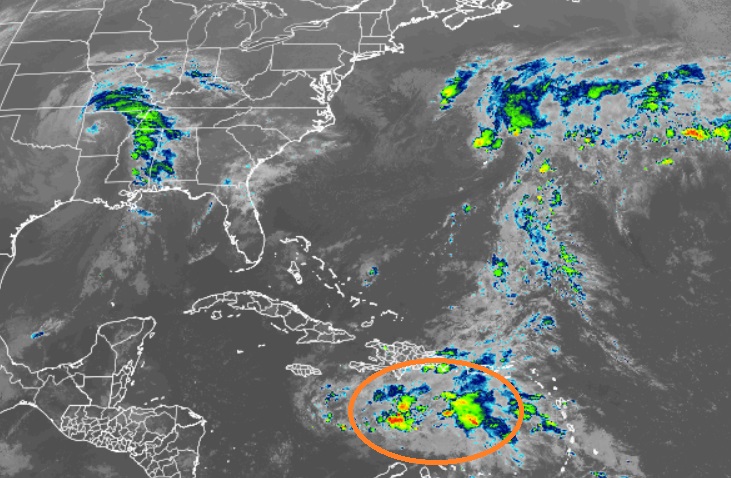 The area circled in orange is being closely watched by meteorologists at the National Hurricane Center for signs of tropical cyclone development. Image: NHC