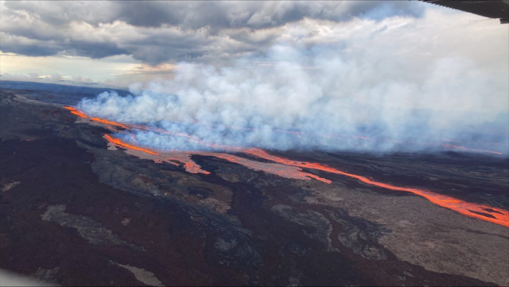 An aerial photograph taken at 7:15 am local time from Civil Air Patrol flight of the ongoing Northeast rift zone eruption of Mauna Loa. Image: USGS