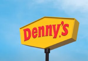 Winds created a freak accident in Kentucky, blowing a sign for Denny's down onto a car below, killing one person and injuring two others. Image: Denny's