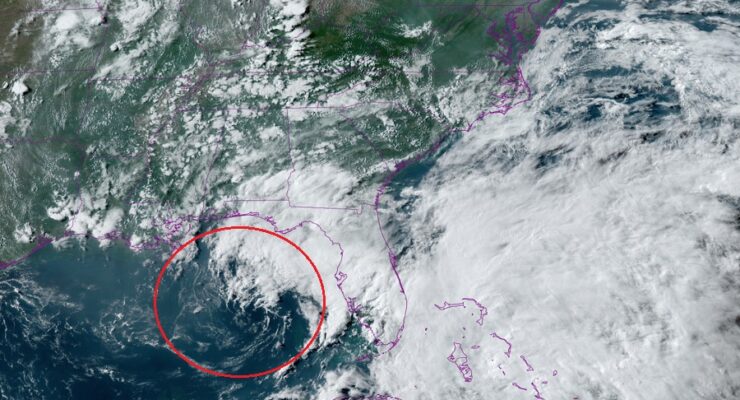 The area circled in red is being monitored by the National Hurricane Center for possible tropical cyclone development. Image: NOAA