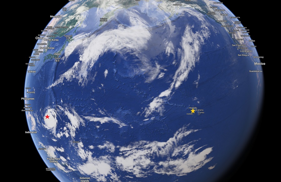 Current view of the globe with a weather satellite overlay shows Guam, left, under a red star, and Hawaii, right, under a yellow star. The U.S. West Coast appears on the top right portions of this map. Image: Google