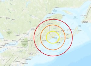 Today's earthquake struck just east of the U.S. / Canada border in New Brunswick at the orange star inside the colored concentric circles. Image: USGS