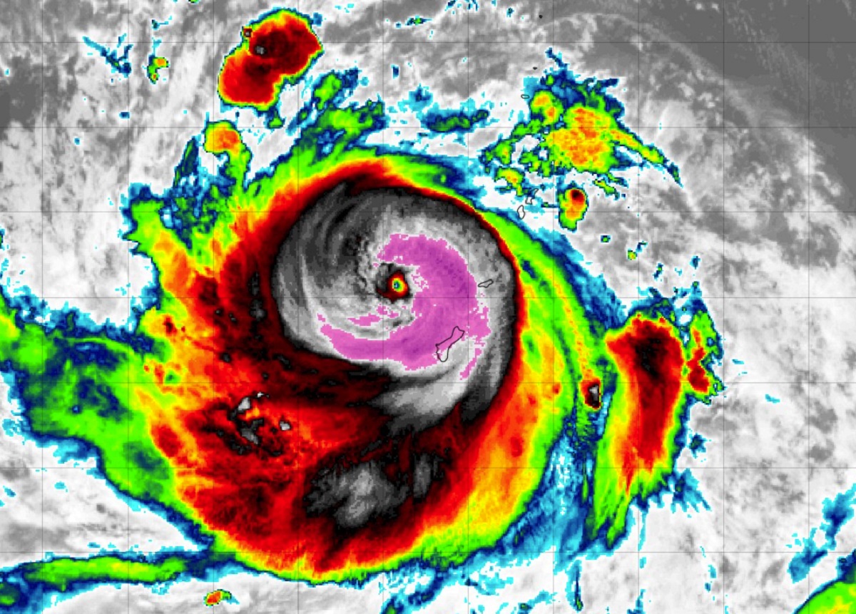 The eye of Typhoon Mawar is just north and east of Guam; the southwest quadrant of the potent storm continues to lash Guam and nearby islands. Image: NOAA