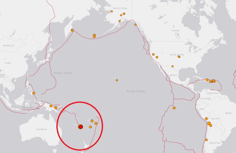 This map reflecting recent earthquakes around the globe as an orange or red dot, has a circle around the large earthquake and its many after shocks which hit in the South Pacific several hours ago, generating a tsunami threat.  Image: USGS