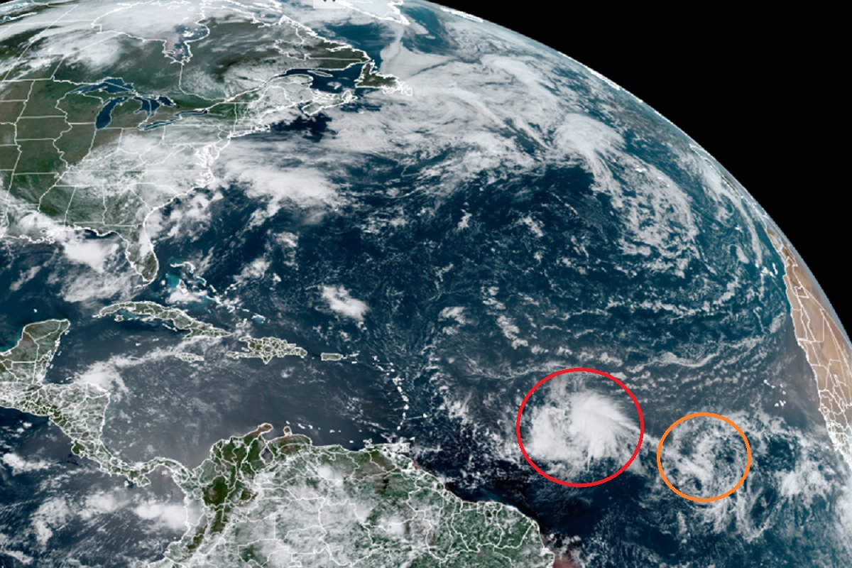 Tropical Storm Bret, circled in red, continues to march west. Another disturbance behind it, circled in orange, may also develop into a tropical cyclone this week. Image: NOAA