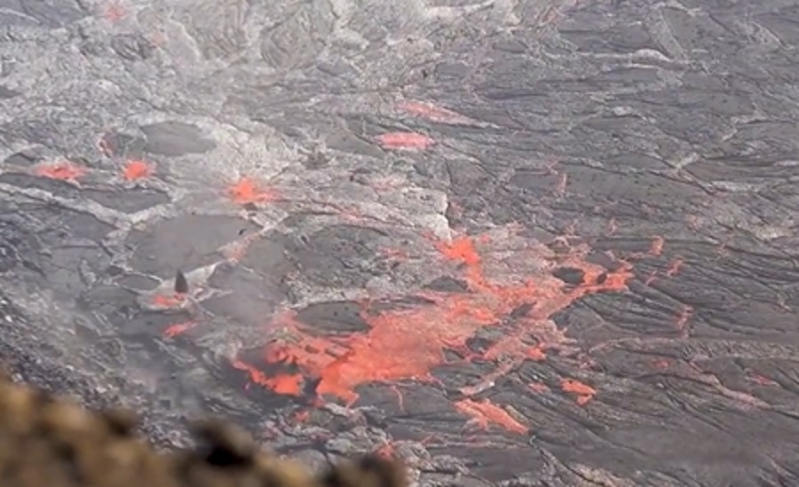 A tornado-like vortex rises from the lake of lava at Kilauea, where surface temperatures are incredibly hot above the 1700-2100 degree lava. Image: USGS
