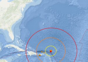 An unusually strong earthquake struck the North Atlantic today at the orange dot inside the colored concentric circles; a moderate aftershock struck nearby at the red dot. Image: USGS
