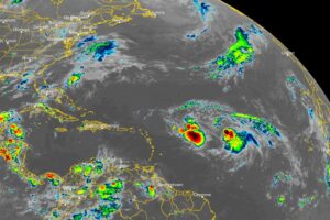 The latest view from the GOES-East weather satellite shows Tropical Storms Philippe, Left, and Rina, Right, in the open waters of the Atlantic east of the Northern Leeward Islands. Image: NOAA