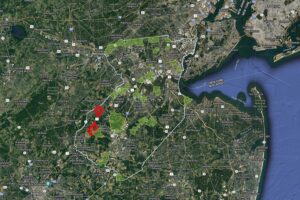The area in red will be sprayed with a potentially harmful chemical to rid the area of mosquitos. The areas in green were already sprayed in recent days and weeks. Image: Middlesex County Mosquito Extermination Commission